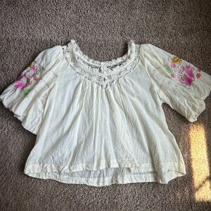 Practically new flowy embroidered free people blouse